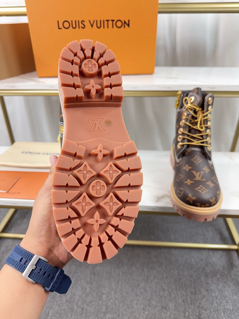 VV  Collaboration monogram embossed ankle boots  25121707