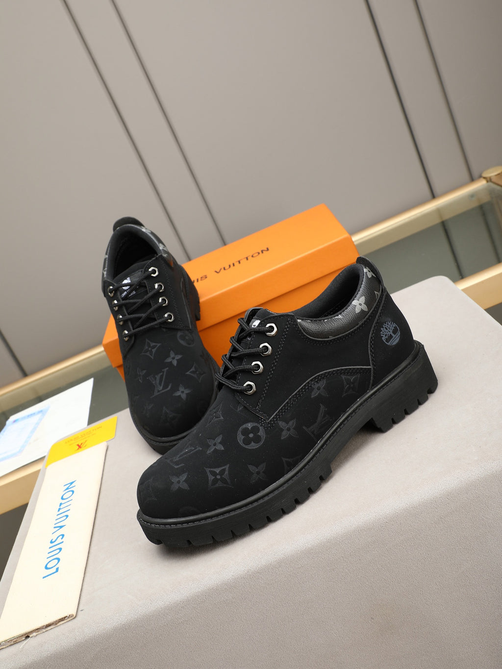 VV Retro-style monogram ankle boots (collaboration model)  2026070301
