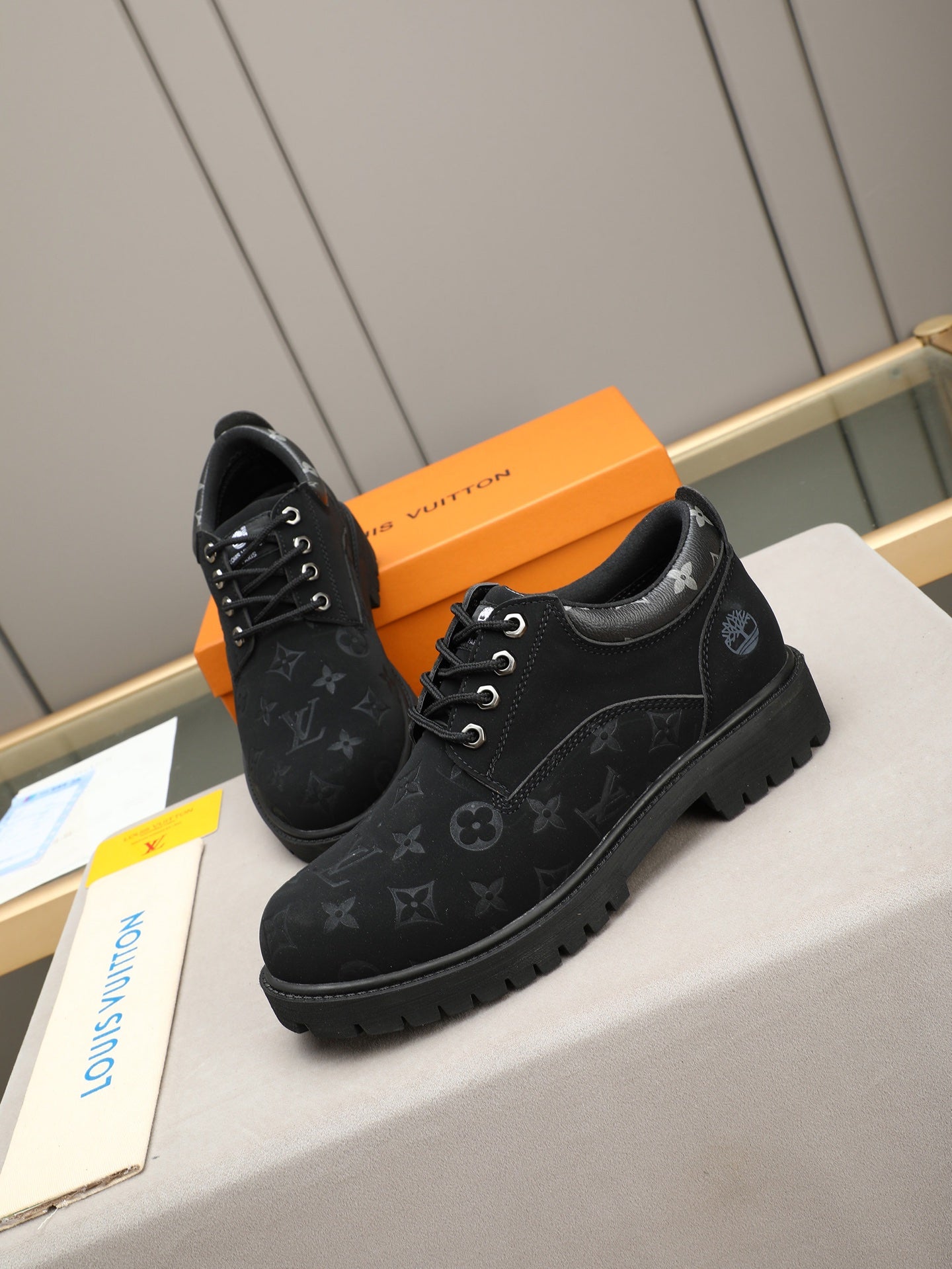 VV Retro-style monogram ankle boots (collaboration model)  2026070301