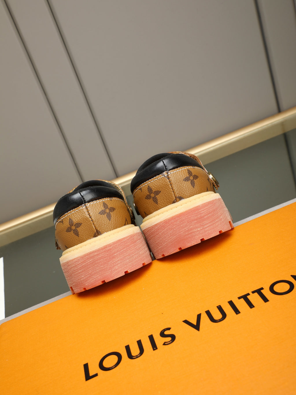 VV Retro-style monogram ankle boots (collaboration model)  2026070202