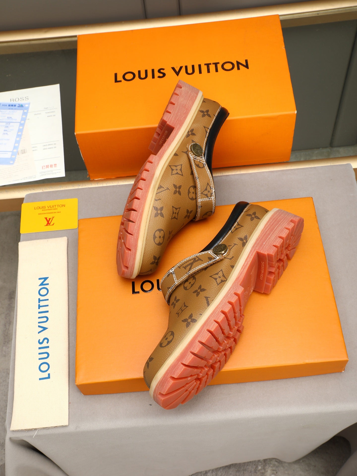 VV Retro-style monogram ankle boots (collaboration model)  2026070202