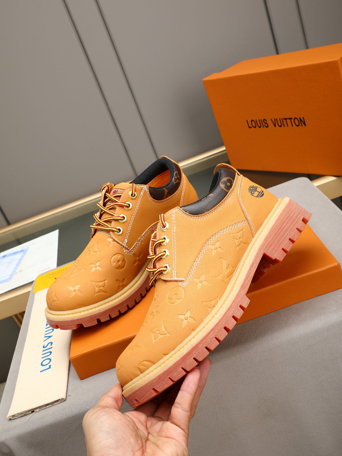 VV Retro-style monogram ankle boots (collaboration model)  2026070301
