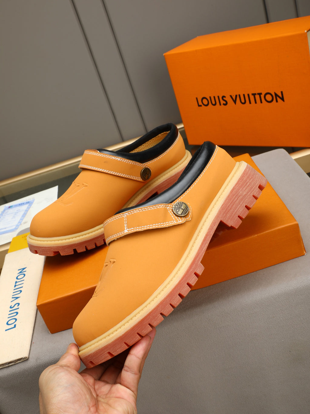 VV Retro-style monogram ankle boots (collaboration model)  2026070201