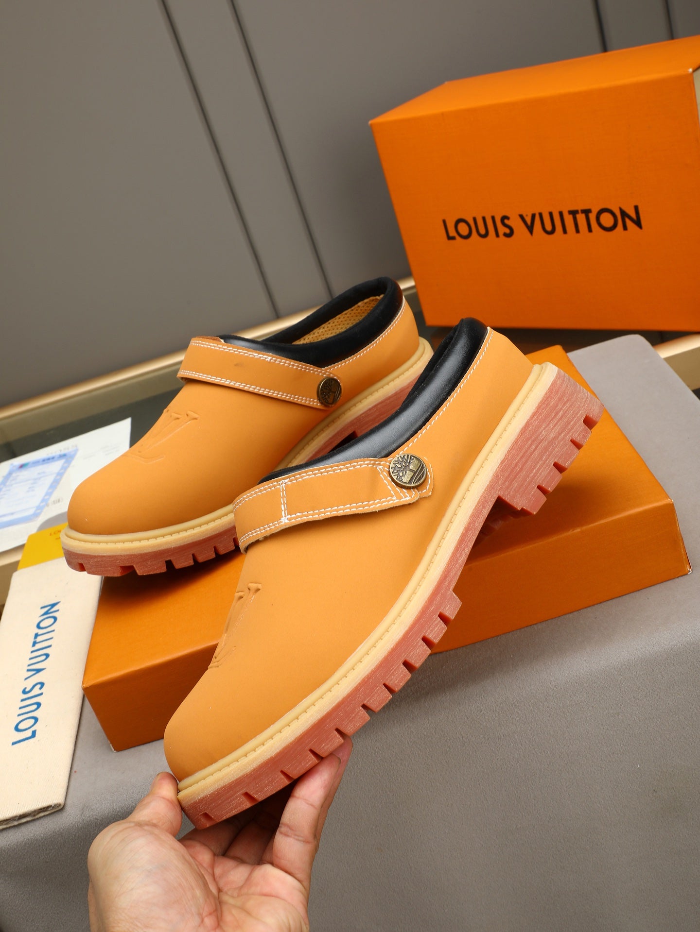 VV Retro-style monogram ankle boots (collaboration model)  2026070201