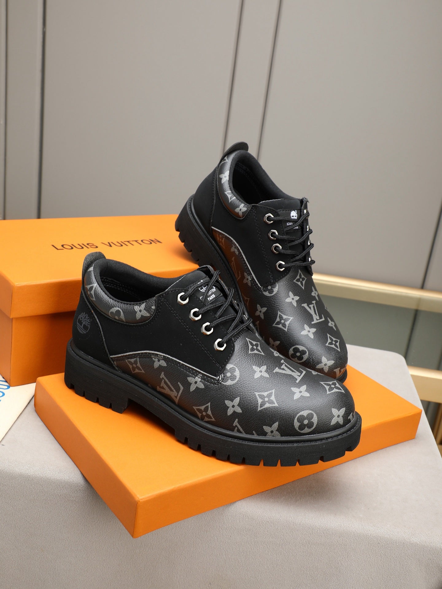 VV Retro-style monogram ankle boots (collaboration model)  2026070301