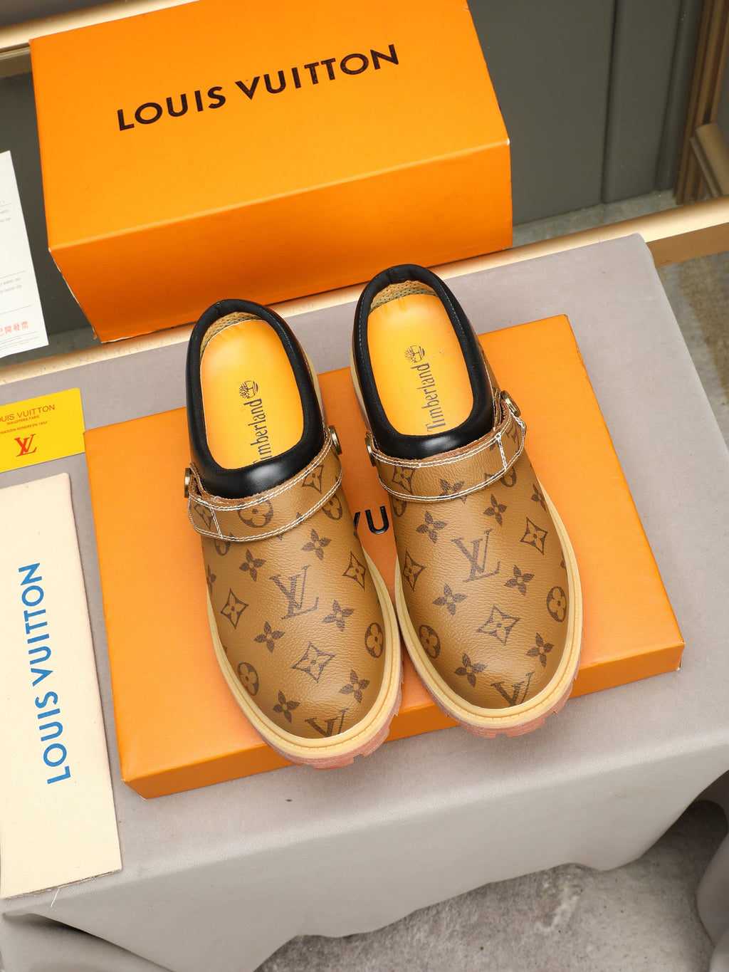 VV Retro-style monogram ankle boots (collaboration model)  2026070202