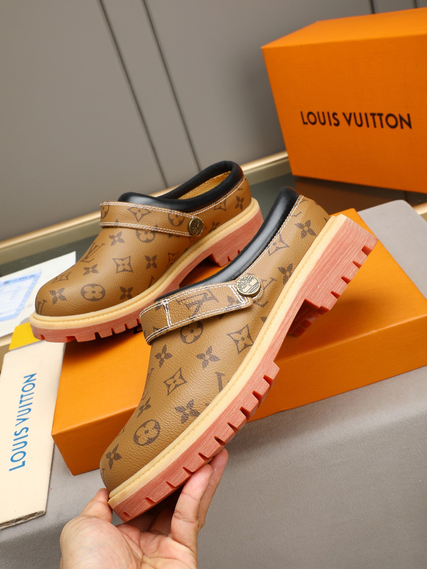 VV Retro-style monogram ankle boots (collaboration model)  2026070202