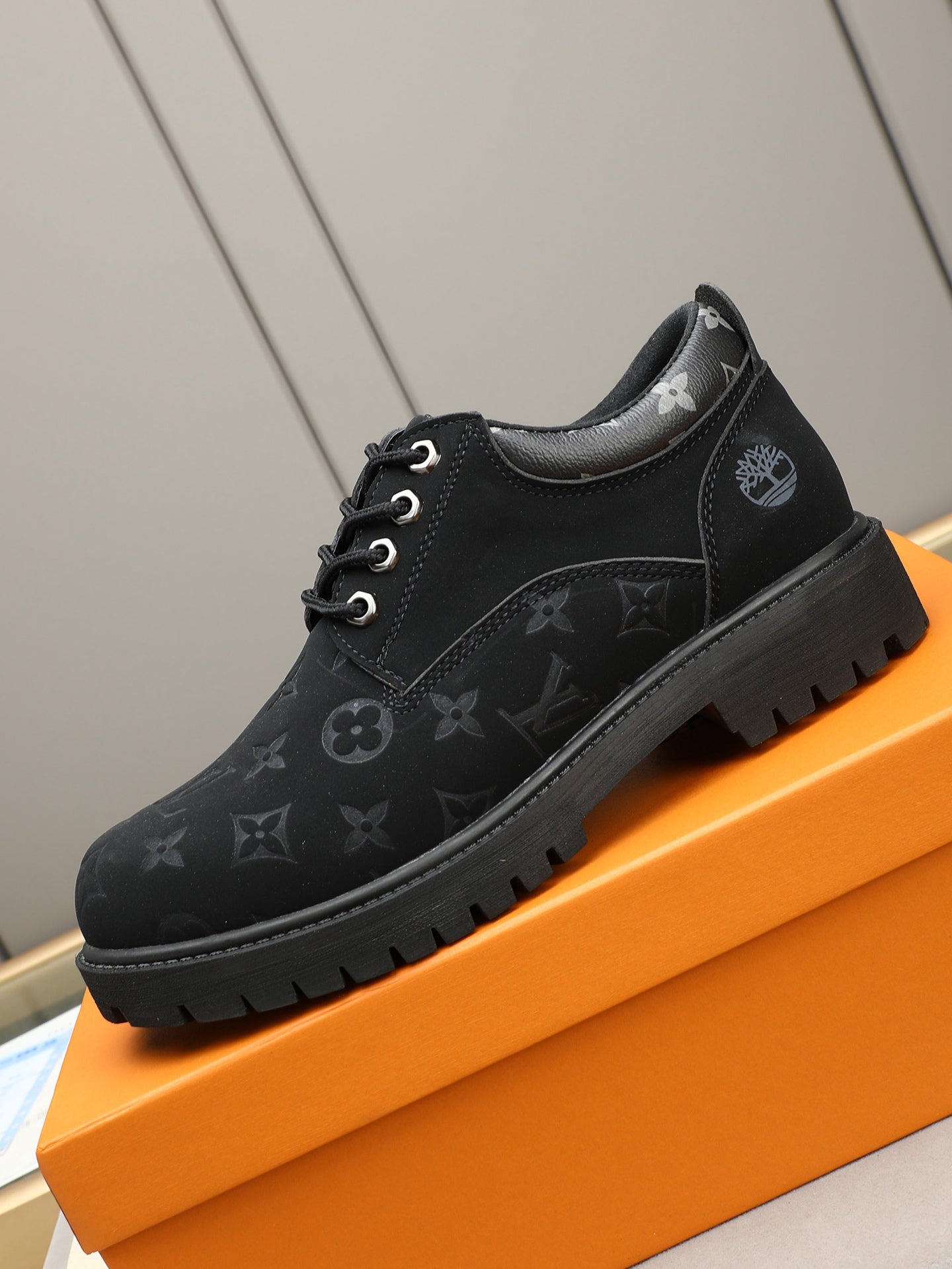 VV Retro-style monogram ankle boots (collaboration model)  2026070301