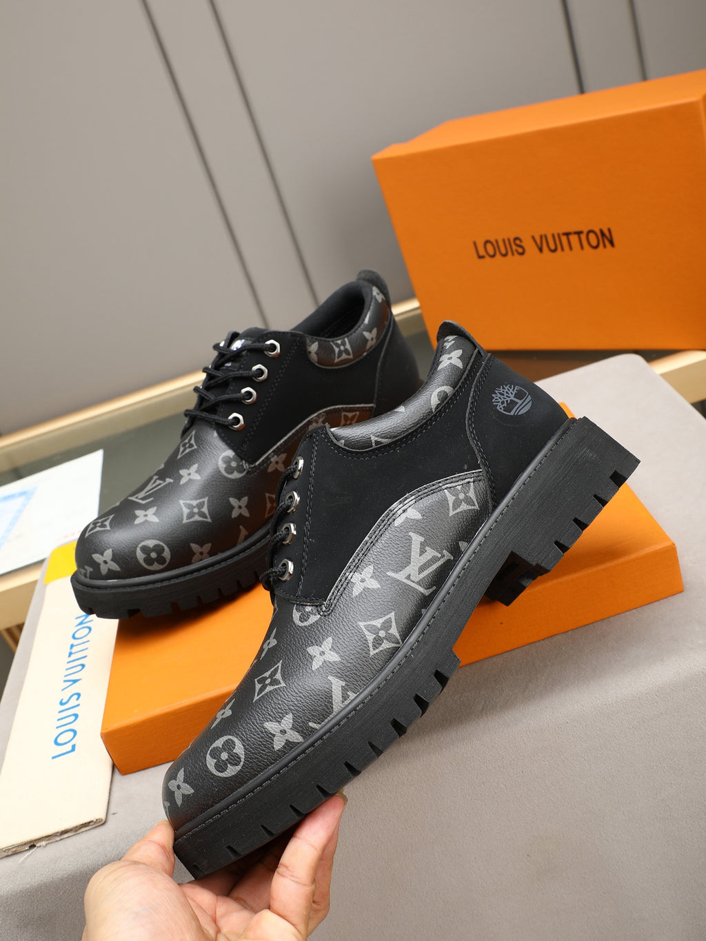 VV Retro-style monogram ankle boots (collaboration model)  2026070301