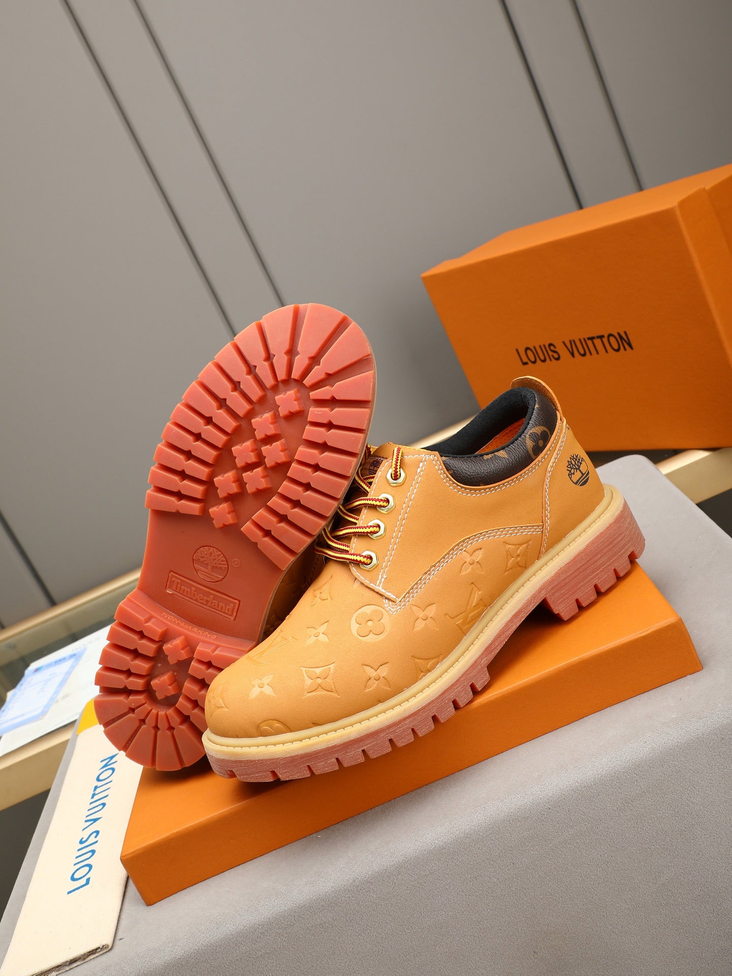 VV Retro-style monogram ankle boots (collaboration model)  2026070301