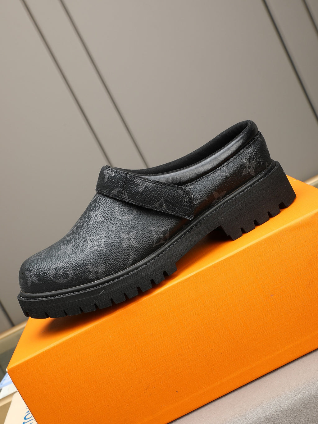 VV Retro-style monogram ankle boots (collaboration model)  2026070202