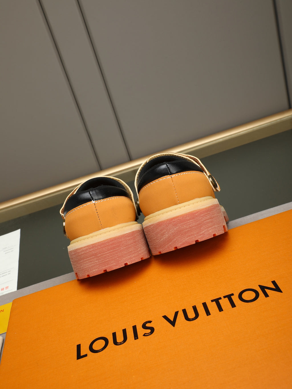 VV Retro-style monogram ankle boots (collaboration model)  2026070201