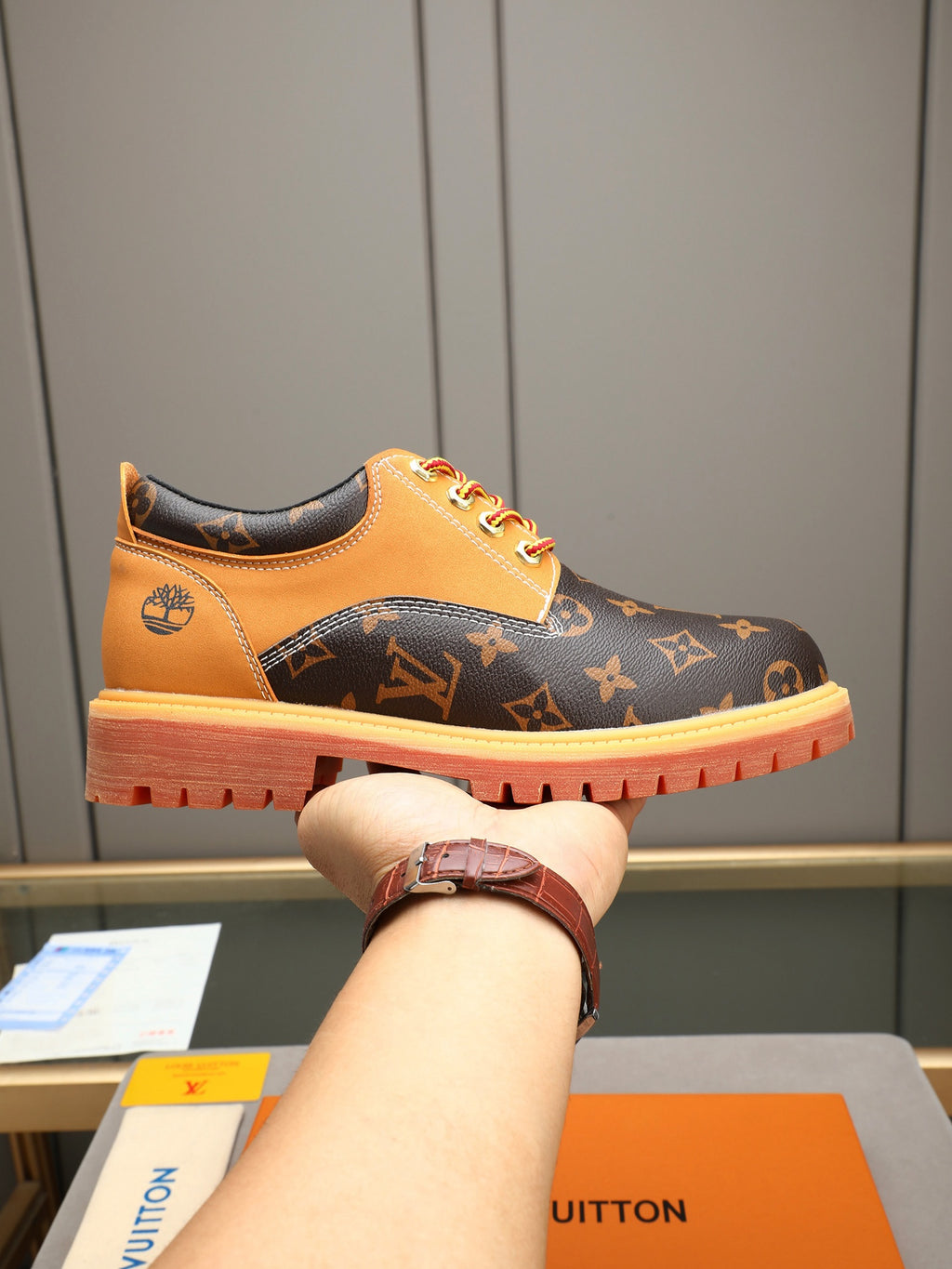 VV Retro-style monogram ankle boots (collaboration model)  2026070301