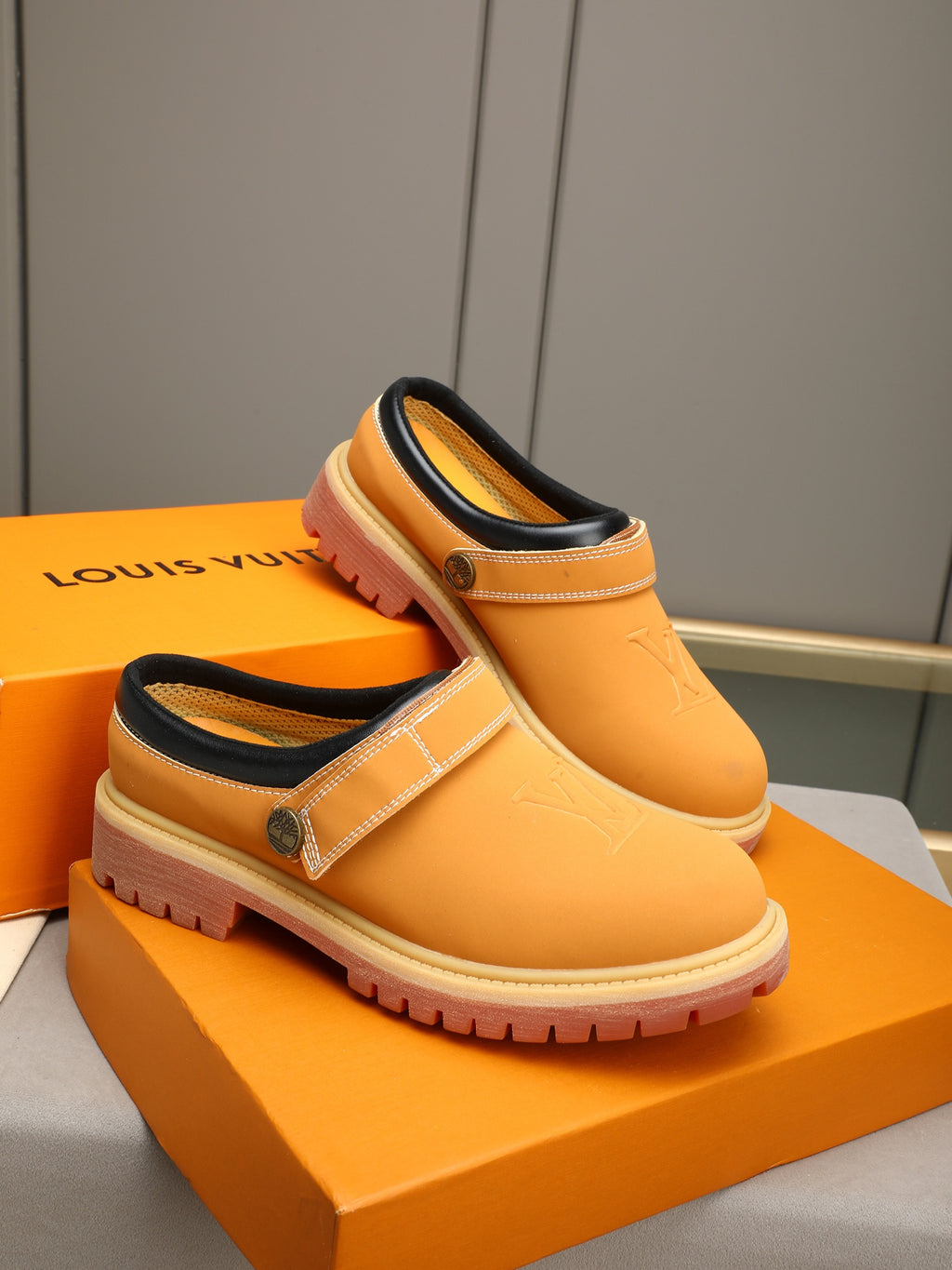 VV Retro-style monogram ankle boots (collaboration model)  2026070201