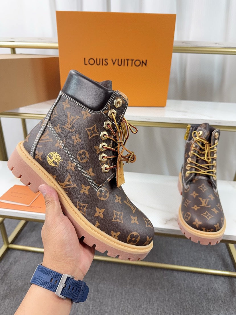 VV  Collaboration monogram embossed ankle boots  25121707