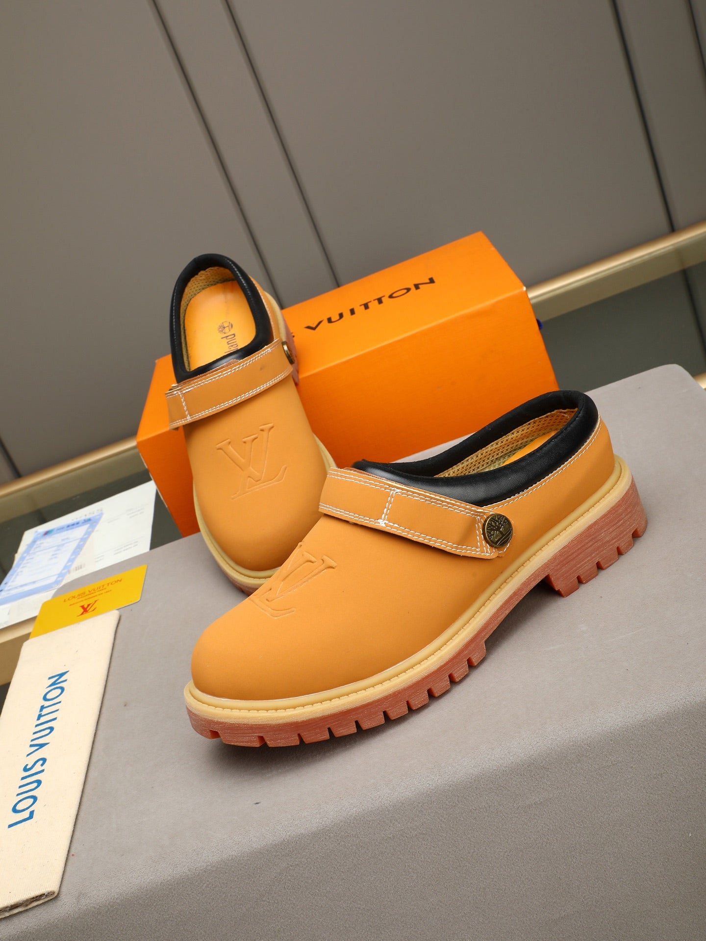 VV Retro-style monogram ankle boots (collaboration model)  2026070201