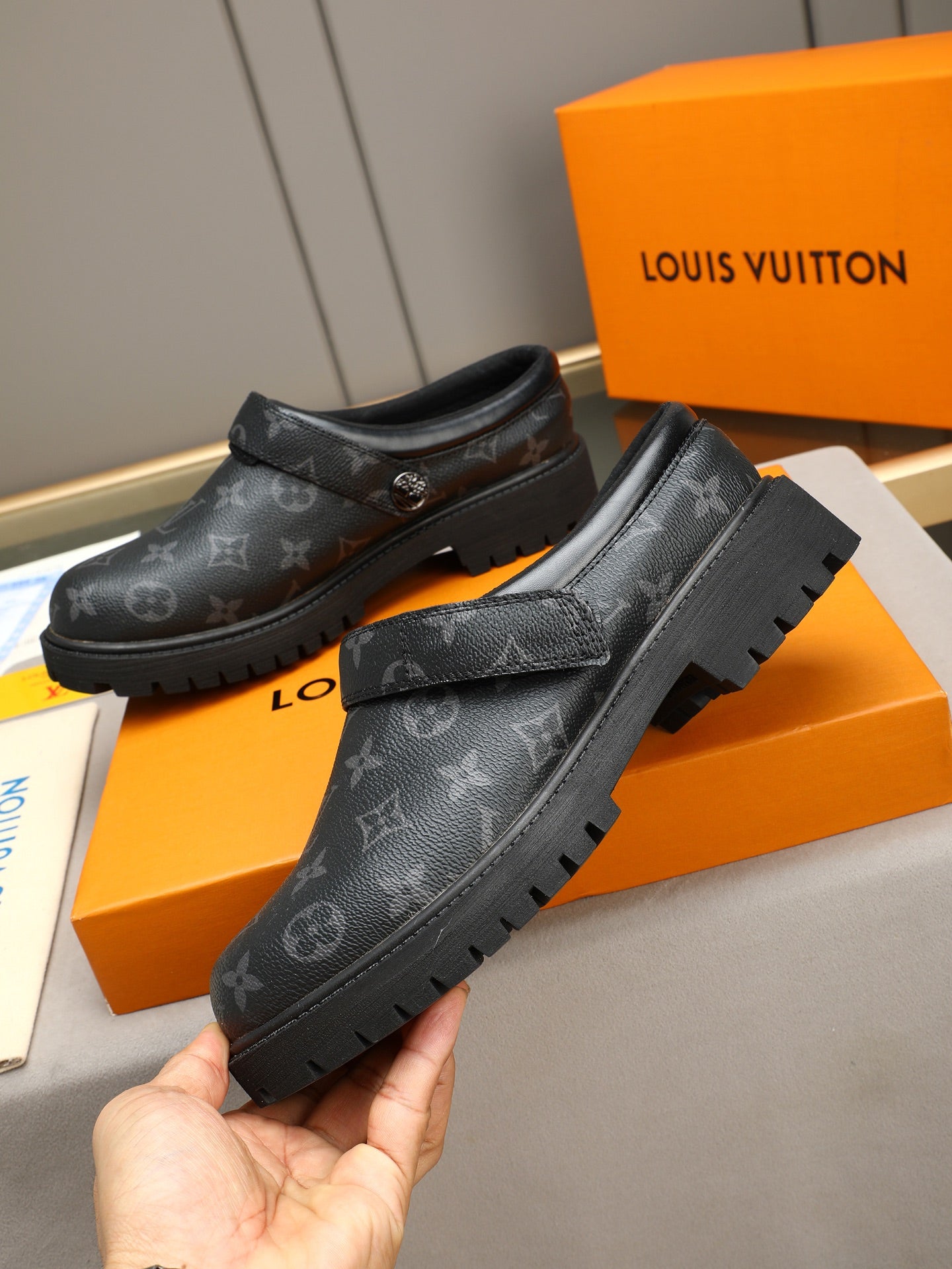 VV Retro-style monogram ankle boots (collaboration model)  2026070202