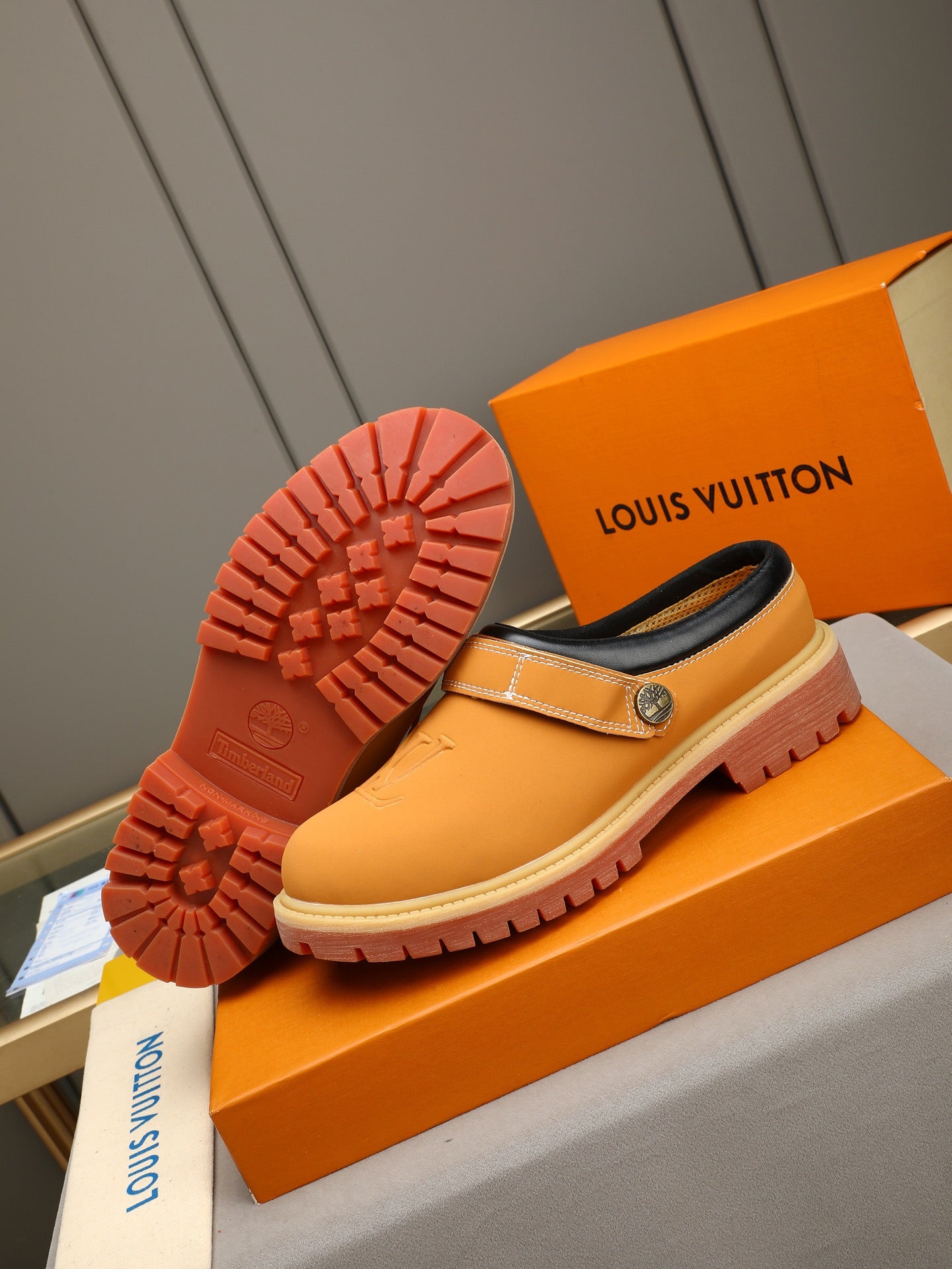 VV Retro-style monogram ankle boots (collaboration model)  2026070201