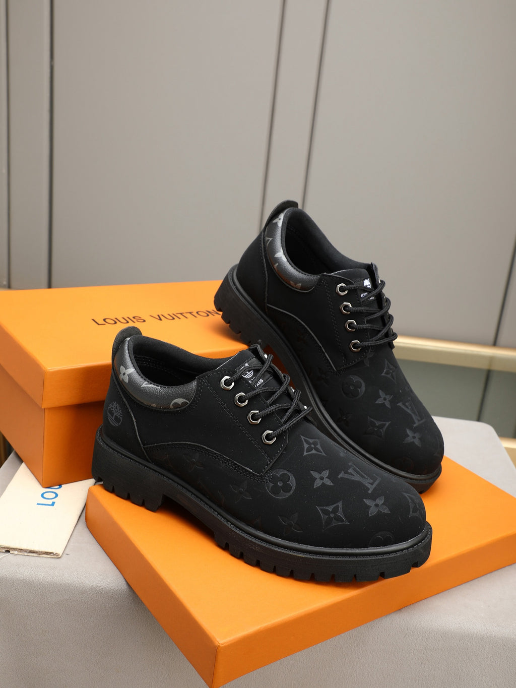 VV Retro-style monogram ankle boots (collaboration model)  2026070301