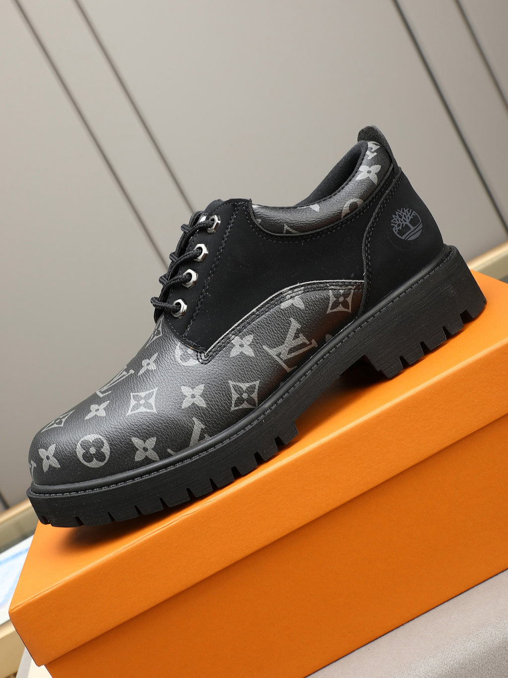 VV Retro-style monogram ankle boots (collaboration model)  2026070301