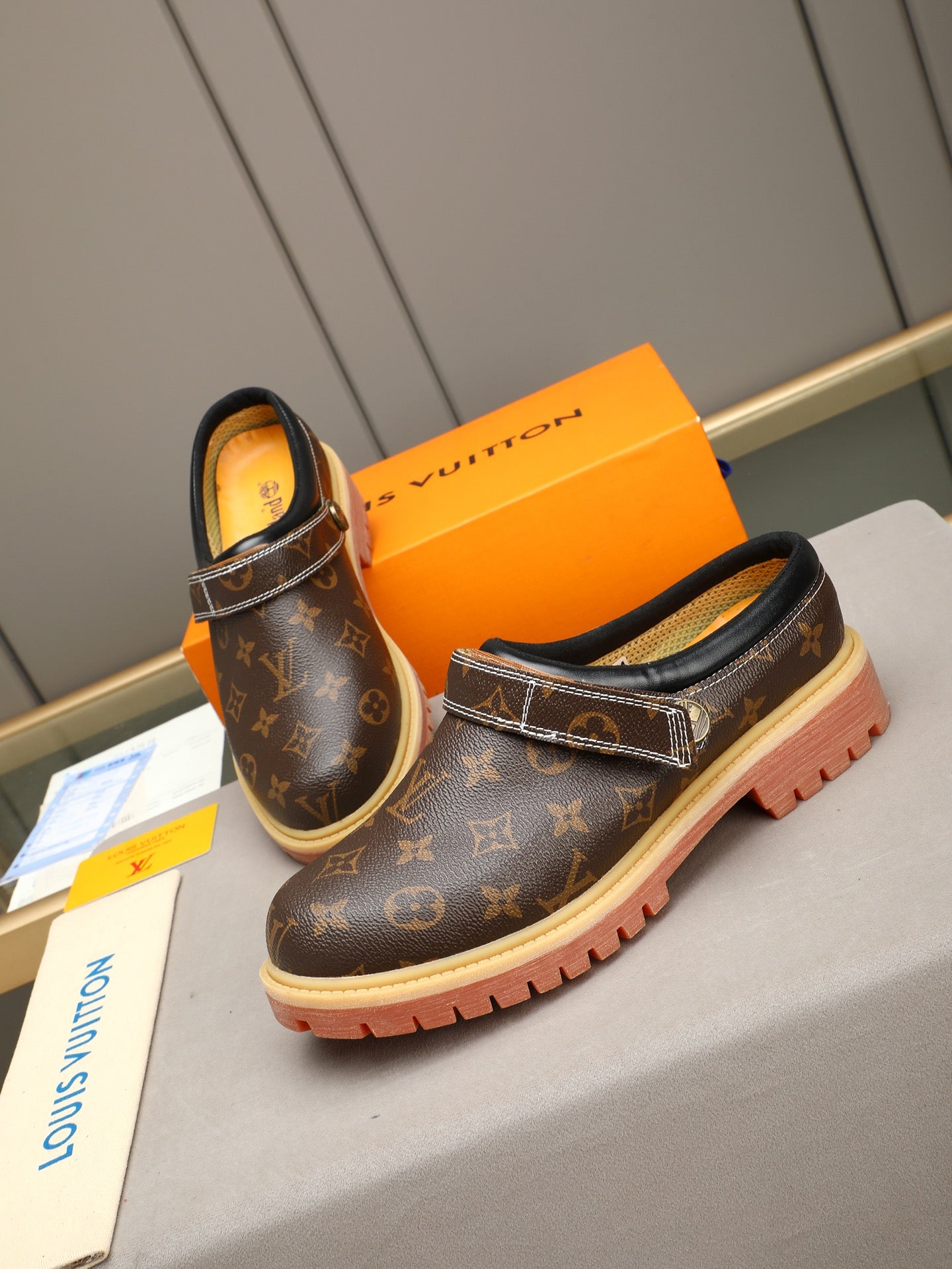 VV Retro-style monogram ankle boots (collaboration model)  2026070202