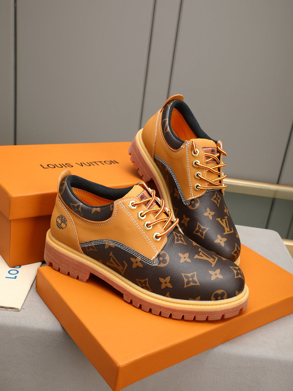 VV Retro-style monogram ankle boots (collaboration model)  2026070301