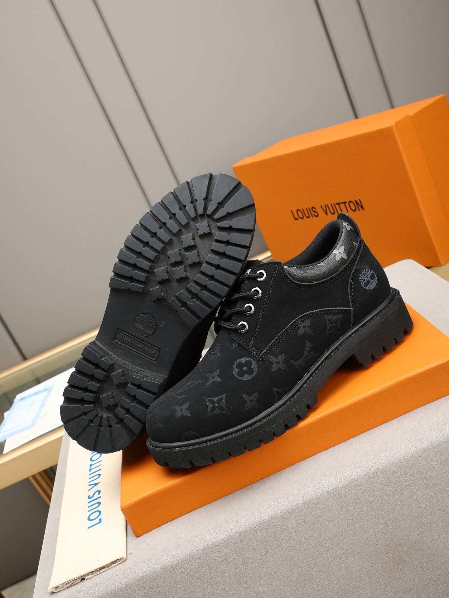 VV Retro-style monogram ankle boots (collaboration model)  2026070301