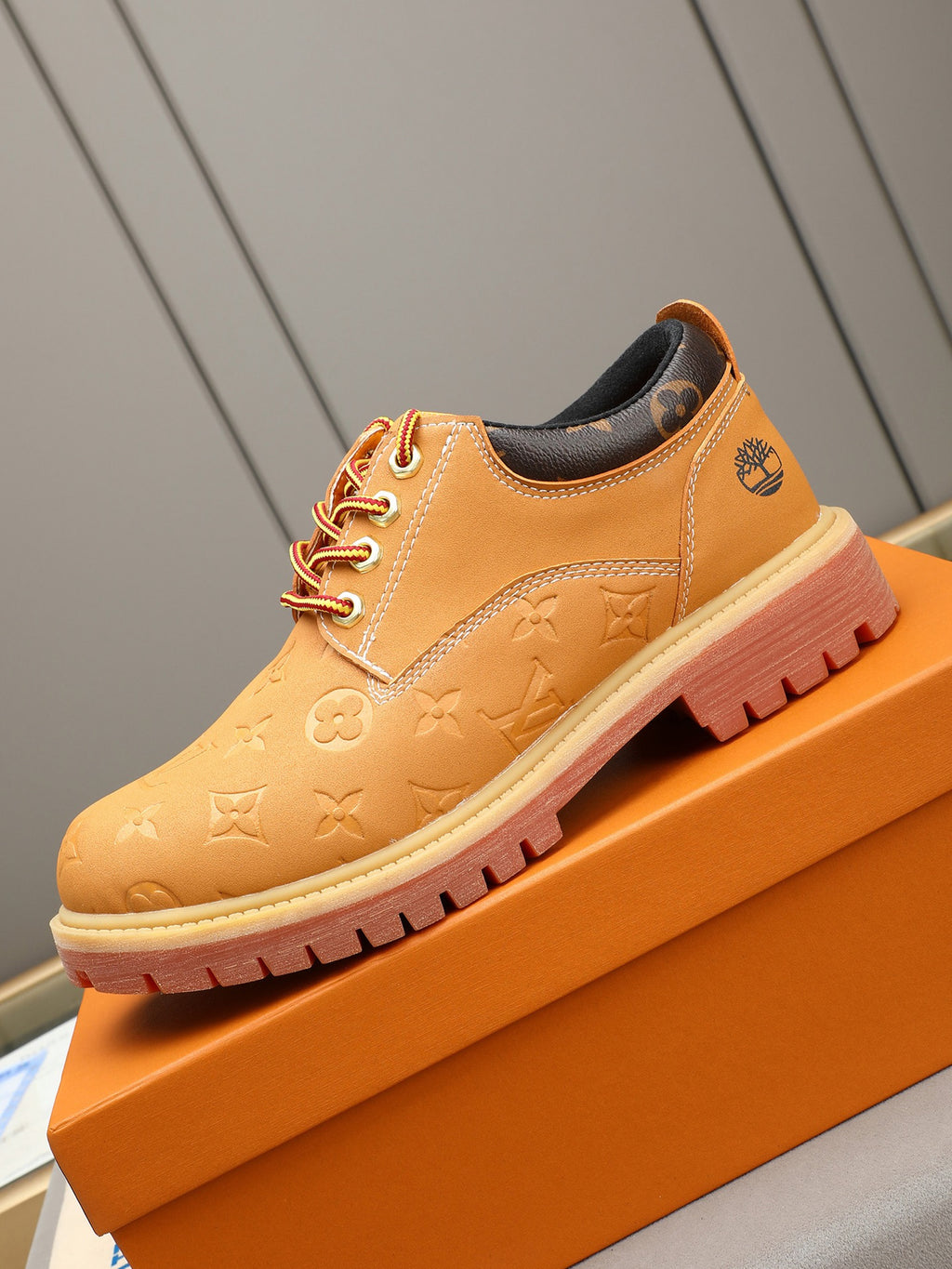 VV Retro-style monogram ankle boots (collaboration model)  2026070301