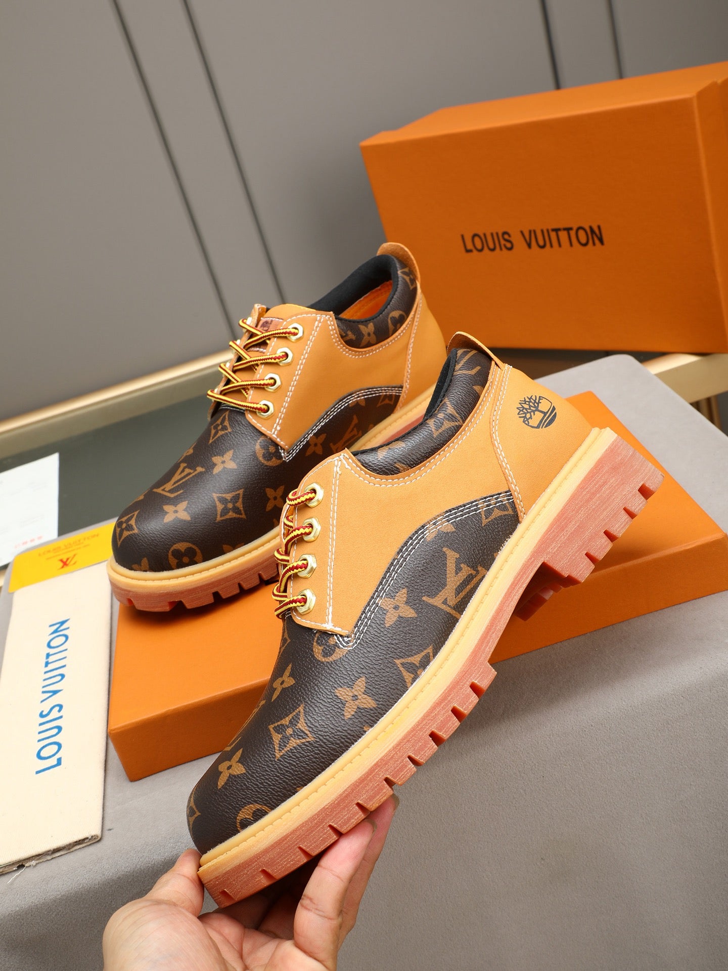 VV Retro-style monogram ankle boots (collaboration model)  2026070301