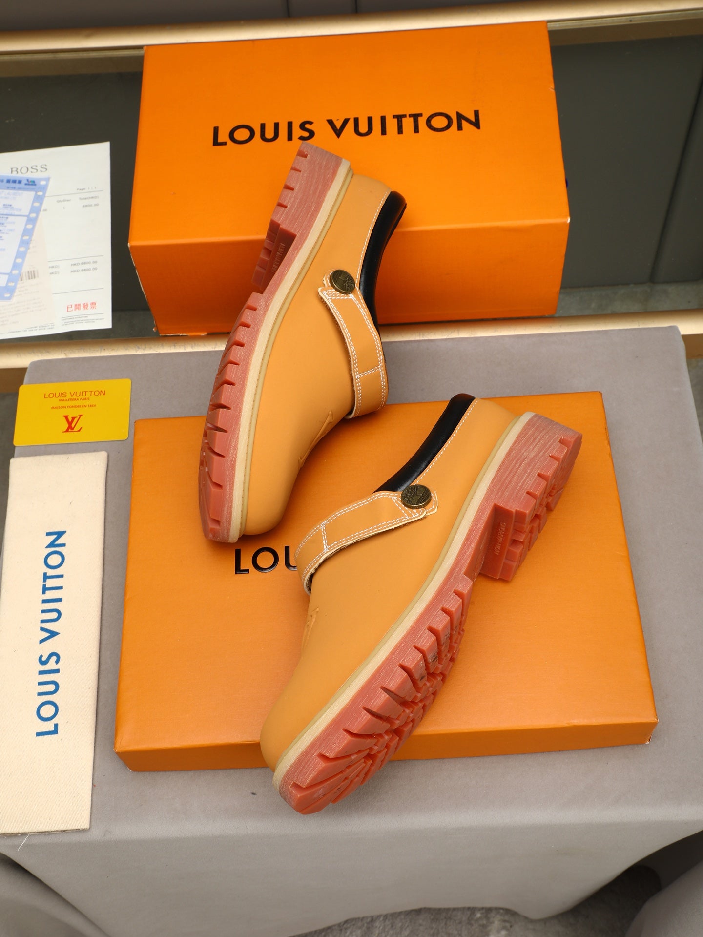 VV Retro-style monogram ankle boots (collaboration model)  2026070201