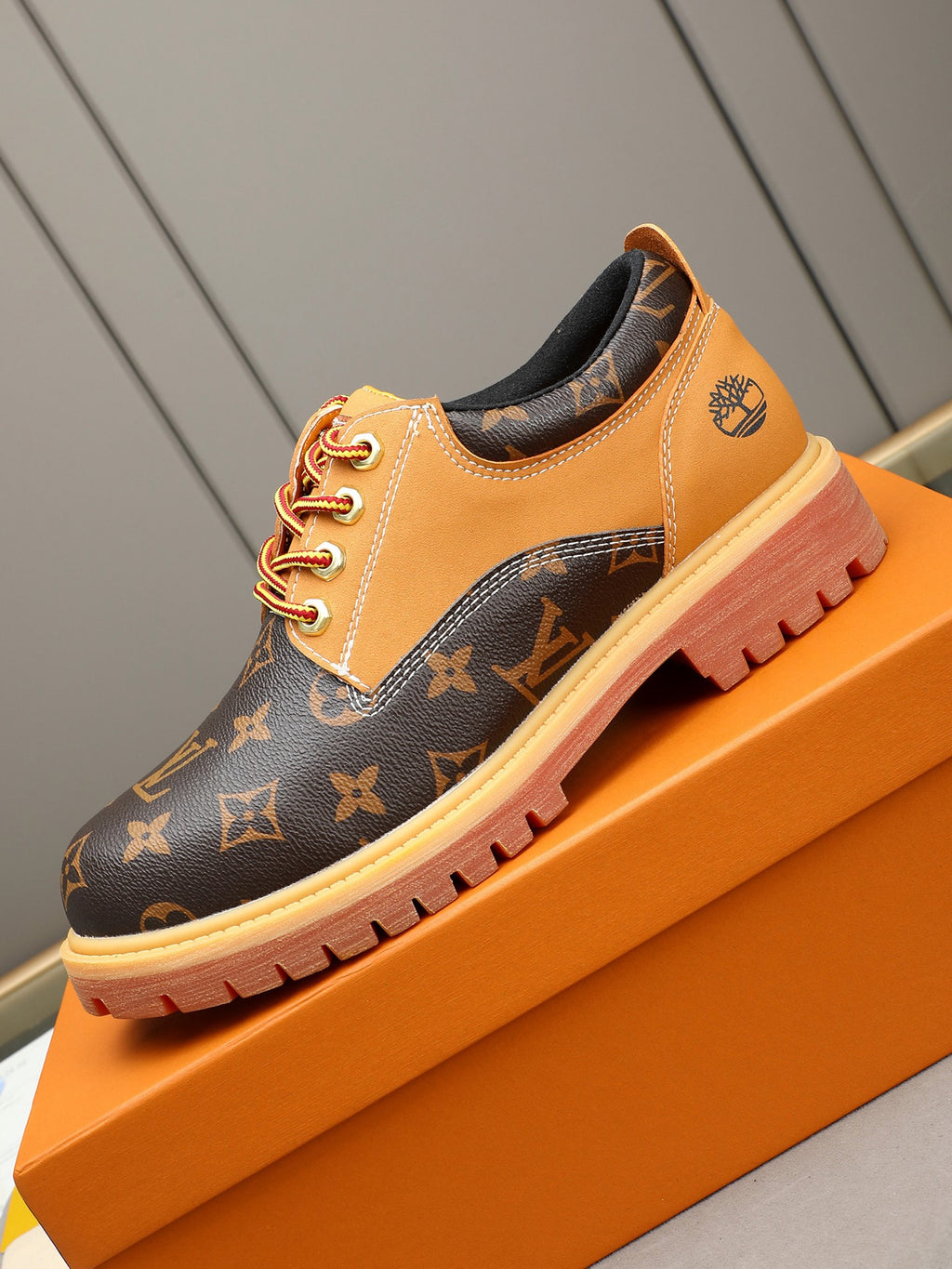 VV Retro-style monogram ankle boots (collaboration model)  2026070301