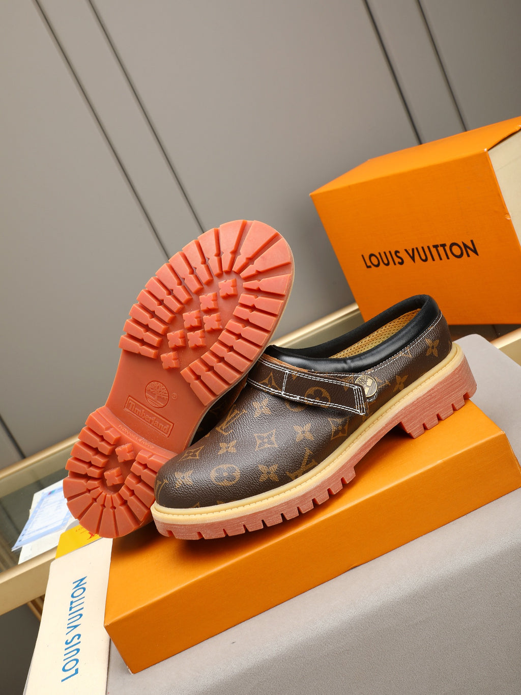 VV Retro-style monogram ankle boots (collaboration model)  2026070202