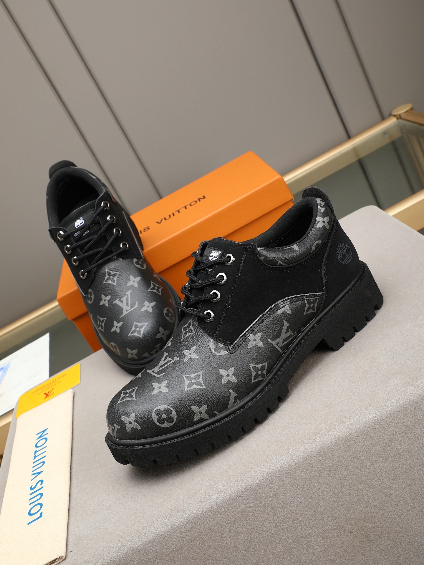 VV Retro-style monogram ankle boots (collaboration model)  2026070301