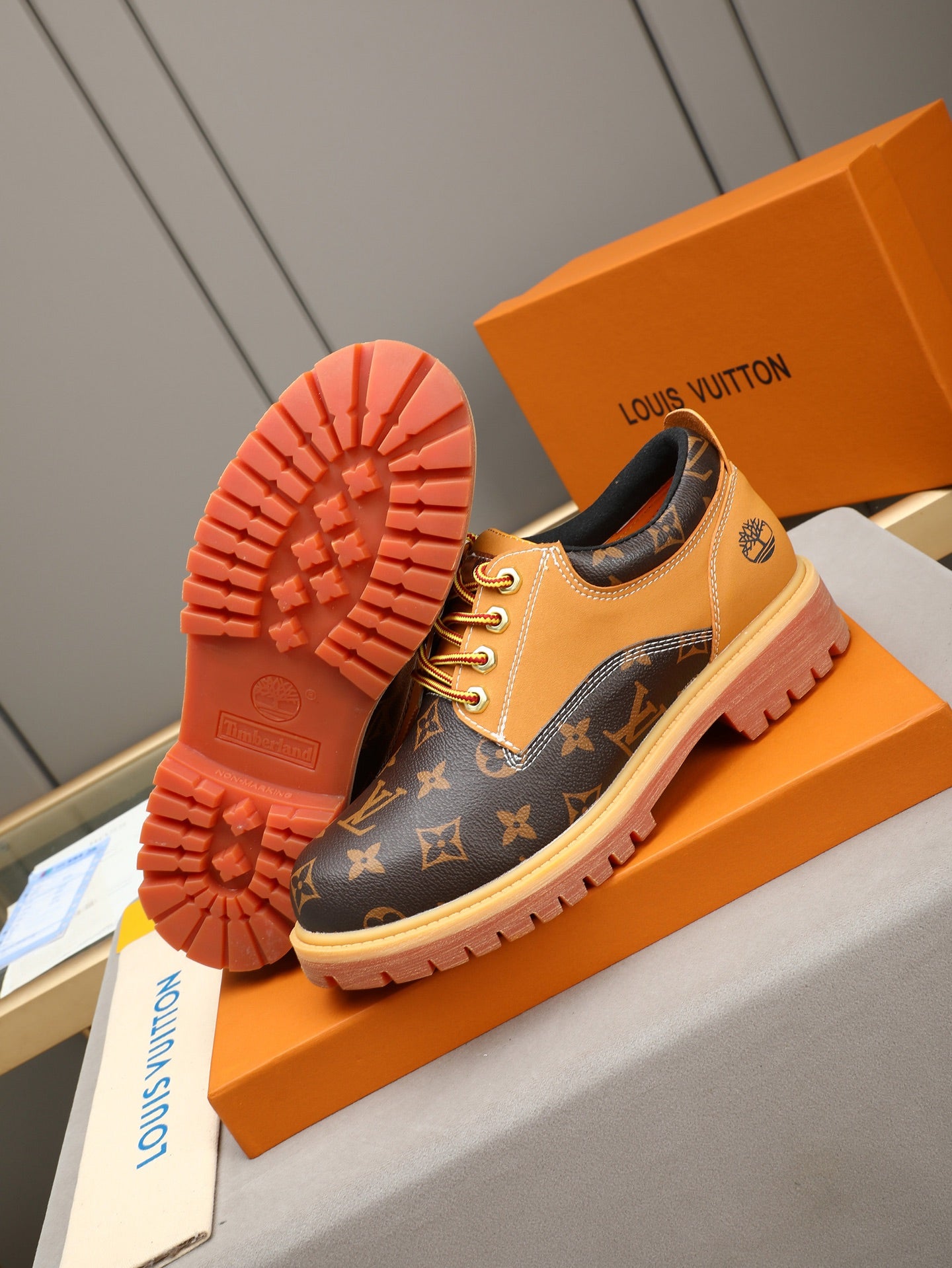 VV Retro-style monogram ankle boots (collaboration model)  2026070301