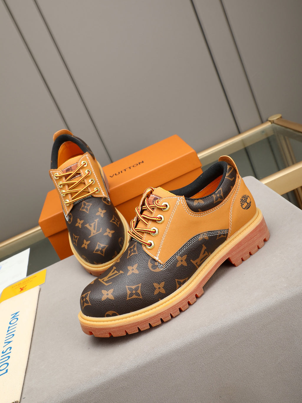 VV Retro-style monogram ankle boots (collaboration model)  2026070301
