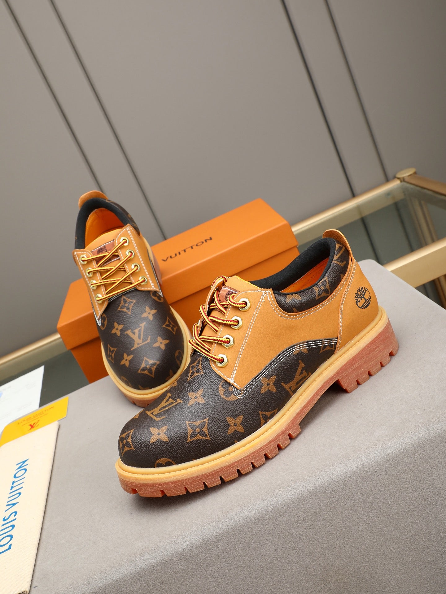 VV Retro-style monogram ankle boots (collaboration model)  2026070301
