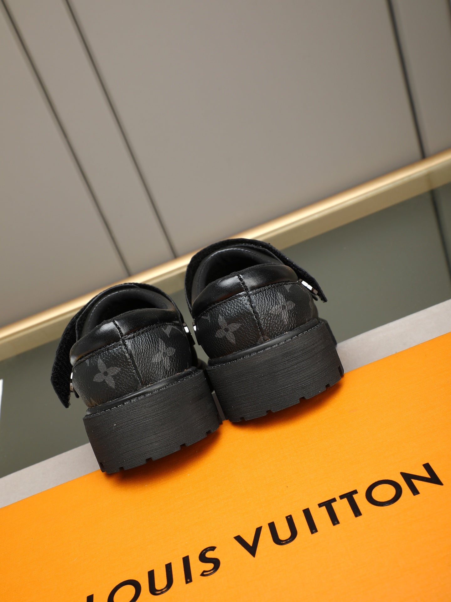 VV Retro-style monogram ankle boots (collaboration model)  2026070202