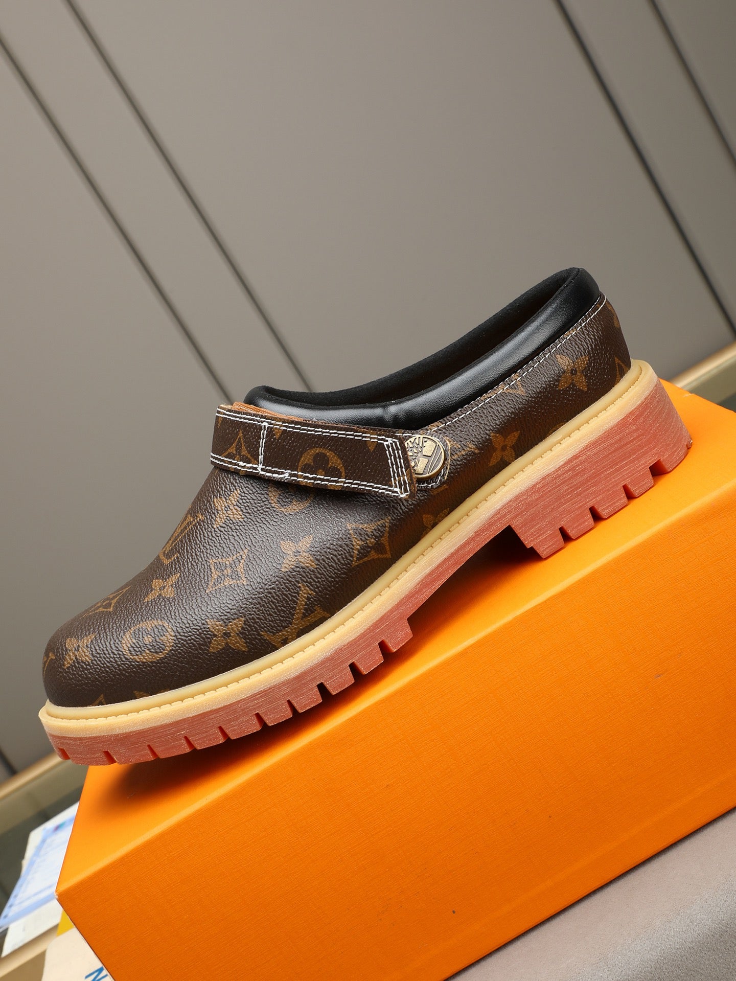 VV Retro-style monogram ankle boots (collaboration model)  2026070202