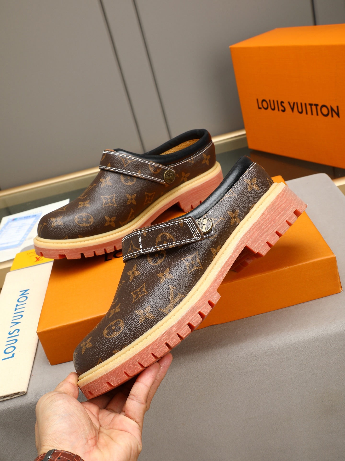 VV Retro-style monogram ankle boots (collaboration model)  2026070202