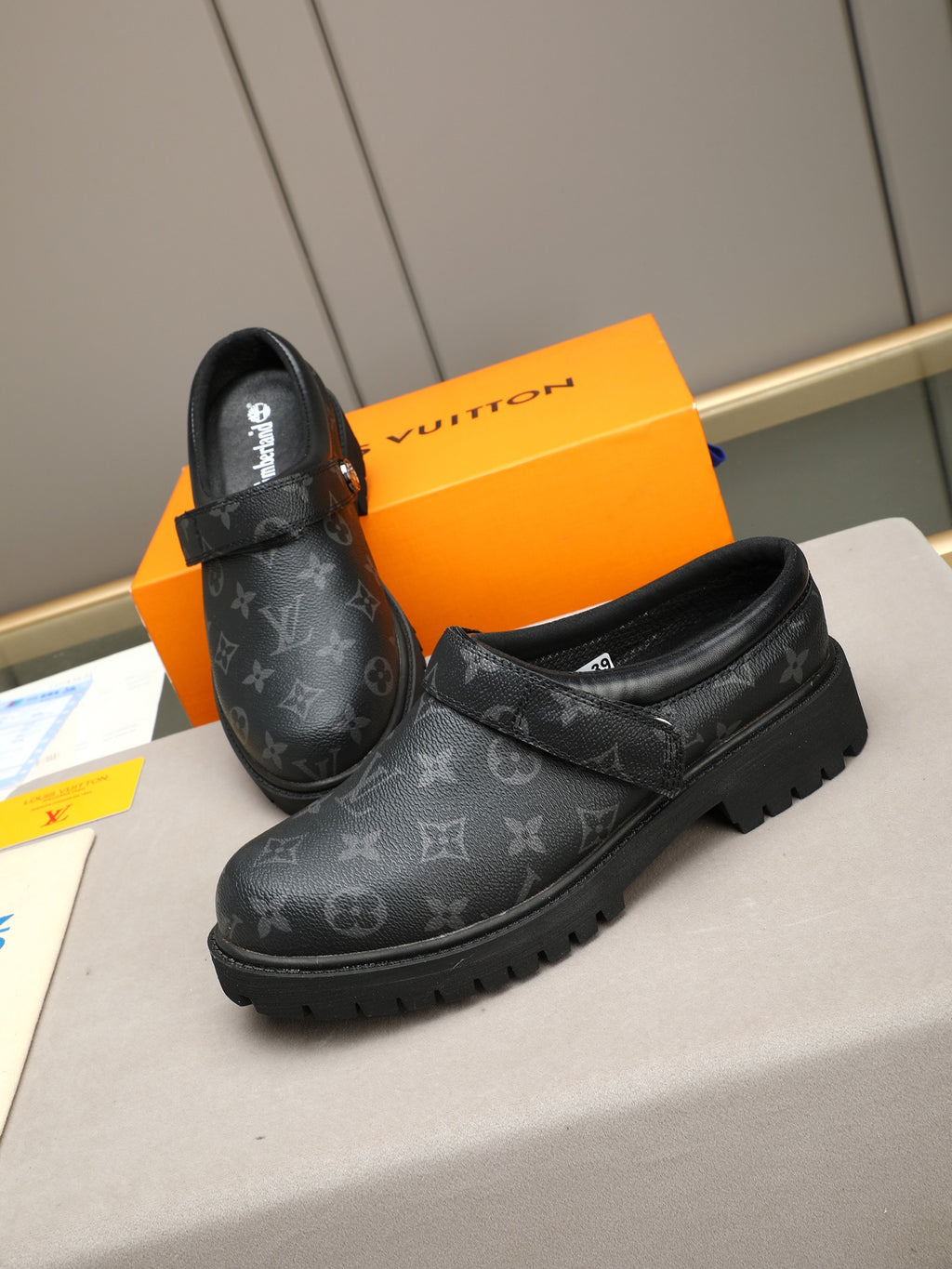 VV Retro-style monogram ankle boots (collaboration model)  2026070202