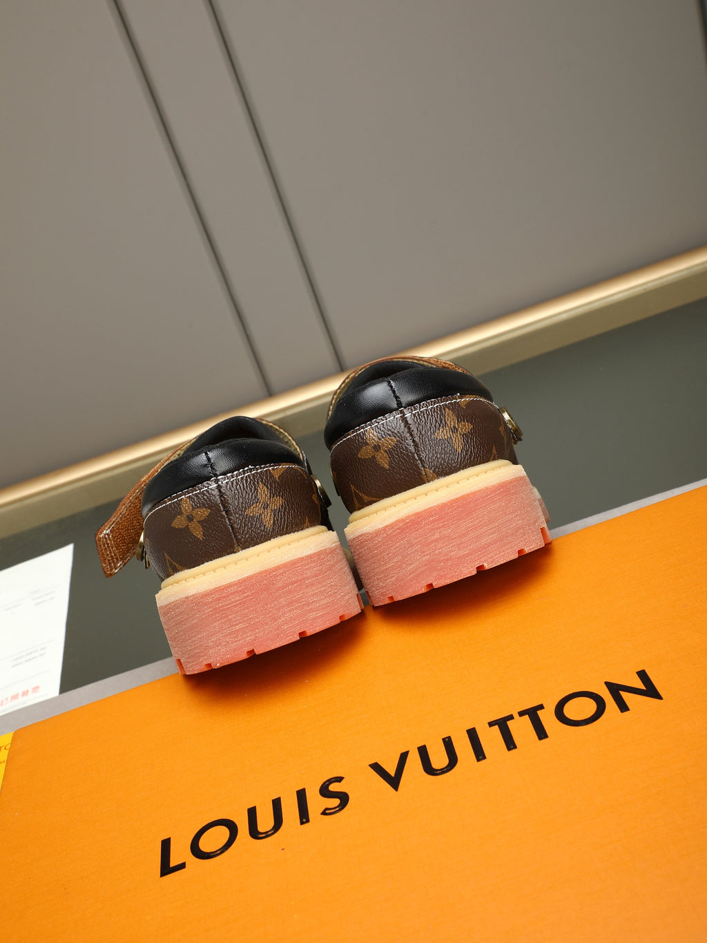 VV Retro-style monogram ankle boots (collaboration model)  2026070202