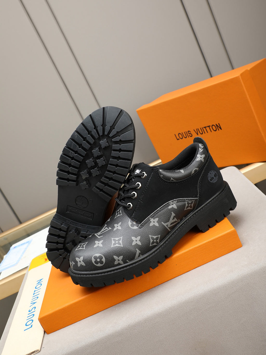 VV Retro-style monogram ankle boots (collaboration model)  2026070301