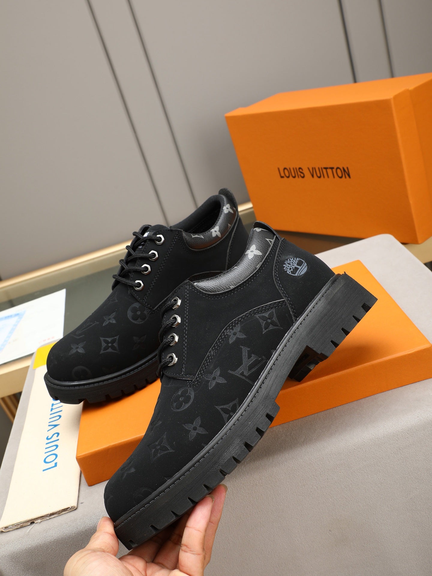 VV Retro-style monogram ankle boots (collaboration model)  2026070301