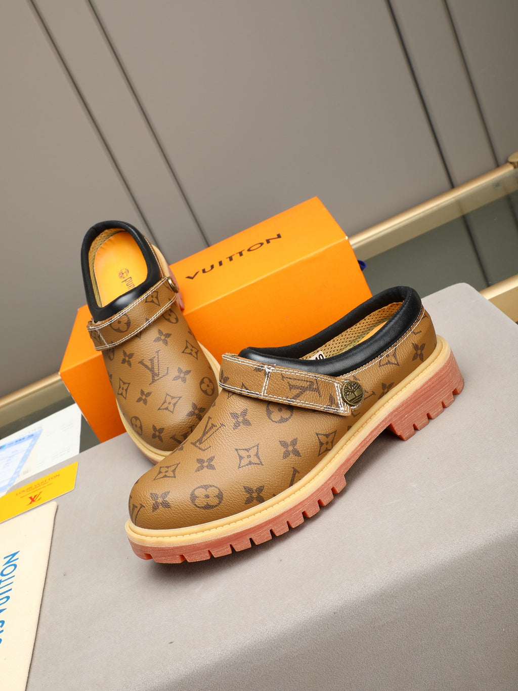 VV Retro-style monogram ankle boots (collaboration model)  2026070202