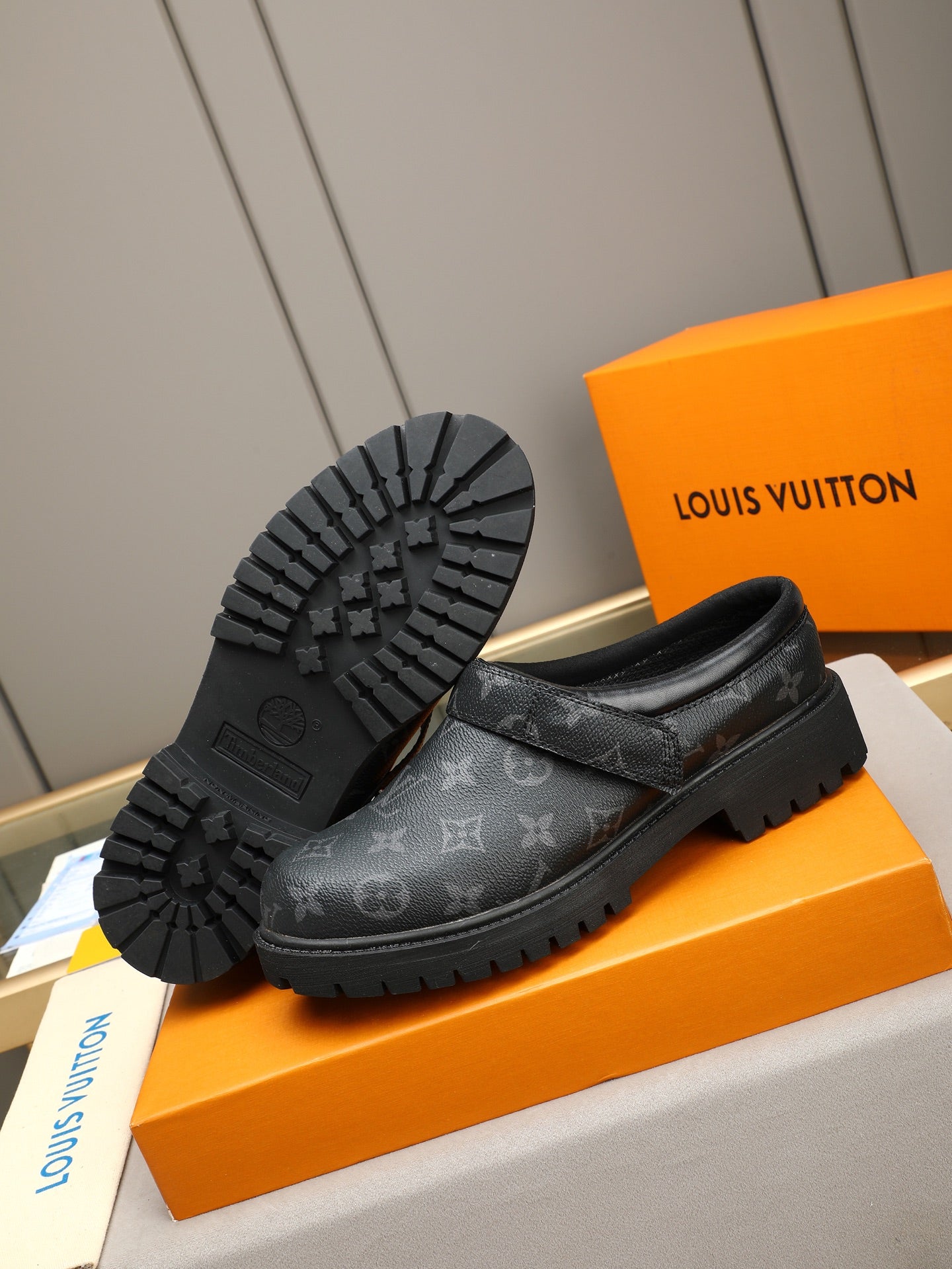 VV Retro-style monogram ankle boots (collaboration model)  2026070202