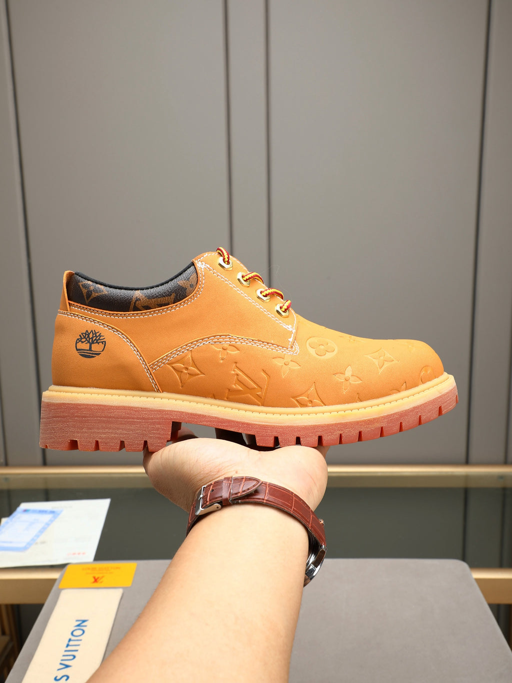 VV Retro-style monogram ankle boots (collaboration model)  2026070301