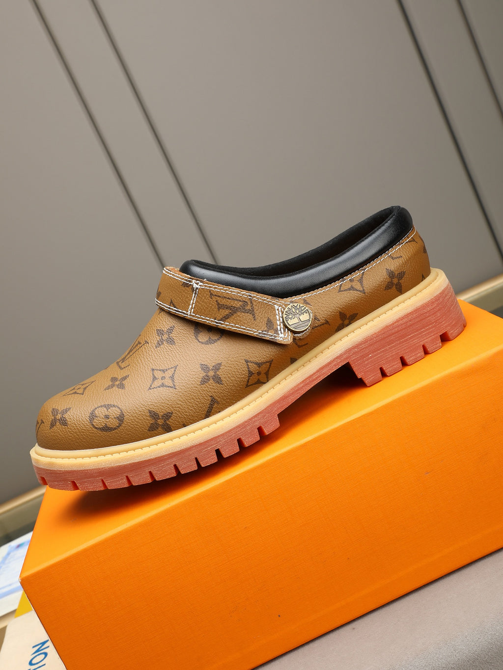 VV Retro-style monogram ankle boots (collaboration model)  2026070202