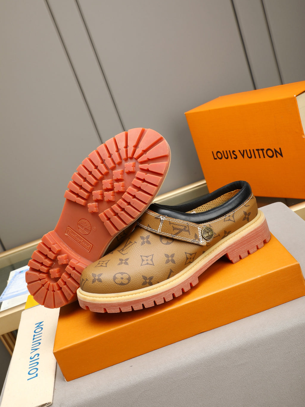 VV Retro-style monogram ankle boots (collaboration model)  2026070202
