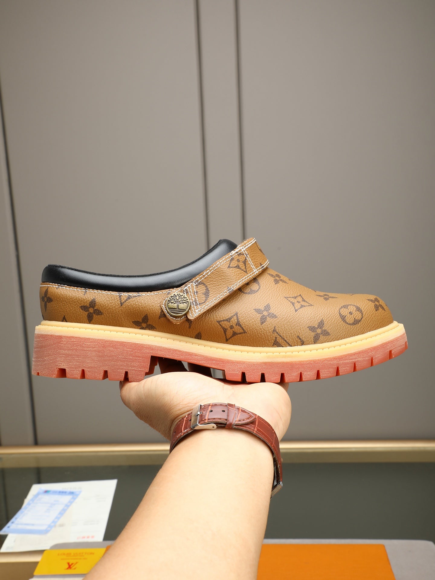 VV Retro-style monogram ankle boots (collaboration model)  2026070202